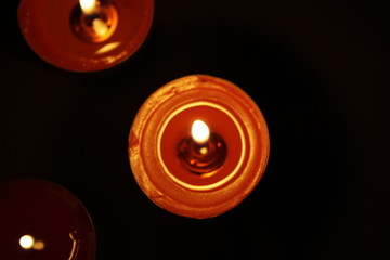 burning candles in the dark