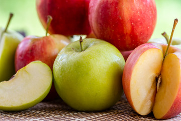Naklejka na ściany i meble Colorful apples on the table