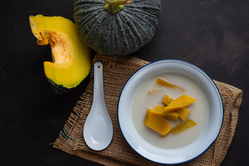 Thai style dessert, Pumpkin in coconut milk - thai called kaeng buad phak tong