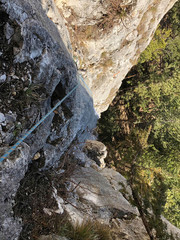 a rope on the rock for climbing
