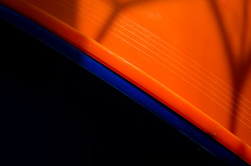 Diagonale astratta in arancione, blu e nero