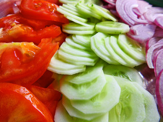 chopped sliced tomato onion and cucumber salad