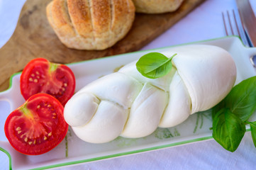 Fresh soft white italian cheese braid mozzarella buffalo made from Italian buffalo's milk by pasta filata method