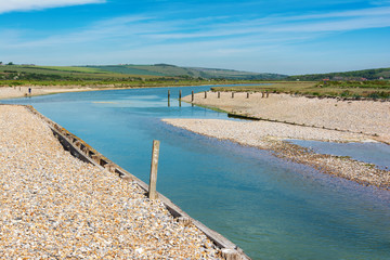 Obraz premium Views of Cucmere river near Seaford and Eastbourne, East Sussex with Cuckmere Haven and Hope Gap beaches nearby, country walks, selective focus