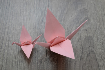 origami cranes isolated white, top down