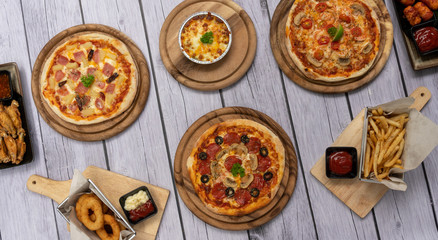 Pizzas, Fried Chicken, Sausages. 