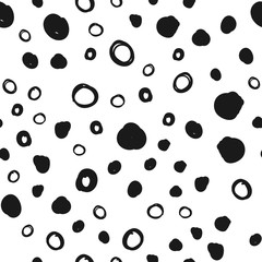 Doodle circles seamless pattern. Black dots texture background.