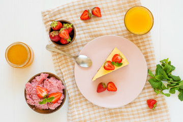 cheesecake with strawberries and pink ice cream, homemade dessert