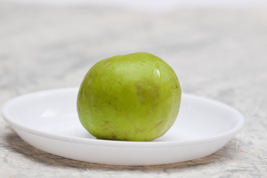 Single small Indian squash or apple gourd isolate on white background