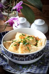 Dumplings with meat, onion and bacon.