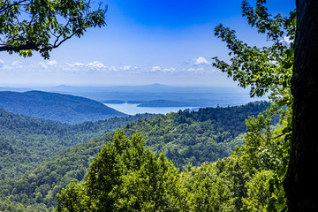 Fototapeta na wymiar Mountains, Lake, scenic, beauty, water, summer, green, blue, relaxing, calming, pleasing