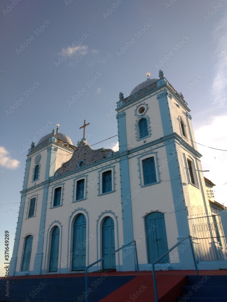 Wall mural white and blue church