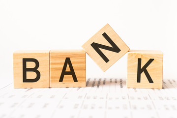 Word bank. Wooden small cubes with letters isolated on white background with copy space available