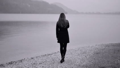 melancholy walk by the lake