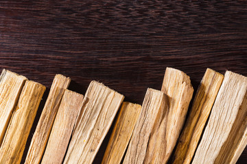 stack of palo santo wood on the table (Bursera graveolens)