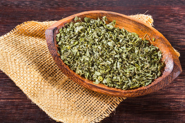 dried moringa leaves in bowl on the table, Moringa oleifera