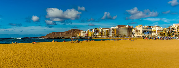 A panorama view of the main beach in Las Palmas, Gran Canaria on a sunny day