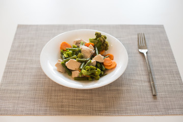 Vegan mix in white plate. Soft selective focus. Healthy concept.