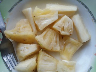 some Pineapple fruit in plate  