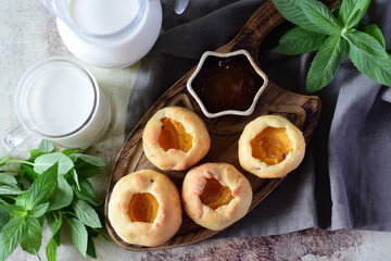 Delicious curds with apricots on a wooden Board. The view from the top