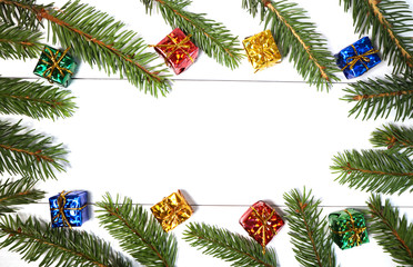 New Year's composition. Fir branches on a white background. Christmas, winter, new year concept. Flat lay, top view, copy space.