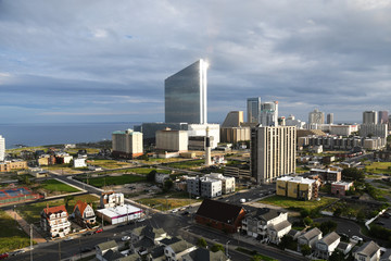 City by the sea. An aerial view some 21 stories up at a nearby hotel offer a rare perspective of the Atlantic City skyline as a beautiful oceanfront sunset descends upon the gambling Mecca. © allen