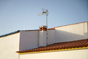 Chimney artfully bricked as a finishing touch on the house roof