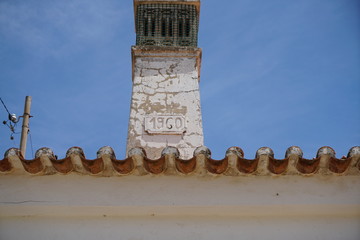 Chimney artfully bricked as a finishing touch on the house roof