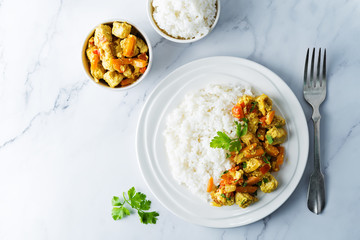 Curry chicken with rice in a plate