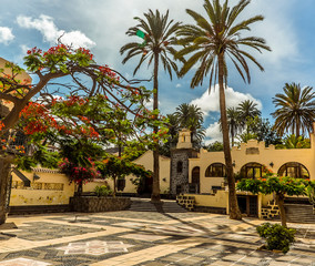 Fototapeta na wymiar A view across a courtyard in the old town in Las Palmas, Gran Canaria on a sunny day