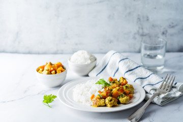 Curry chicken with rice in a plate