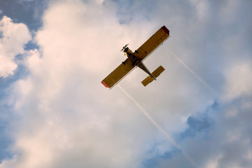  airplane flying in the clouds 