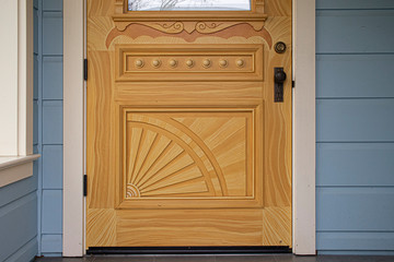 door with intricate wood design
