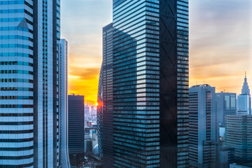 Fototapeta na wymiar Sunrise view over Shinjuku Skyscraper District from window of Hilton Tokyo Hotel Japan up high. 