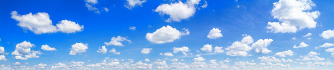 Obraz premium Beautiful summer blue sky landscape with floating white clouds, panorama, banner, as background
