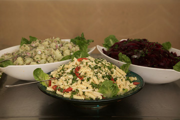 appetizers and salads on the buffet in the hotel Morocco, in the foreground macaroni salad.