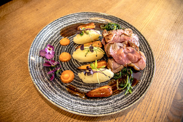 pub lamb main course dish potatoes carrots