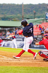 baseball players hitting