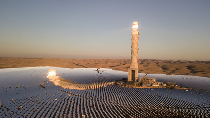The Megalim solar power station in the Negev desert in Israel. The Megalim concentrated solar power and thermal electric power plant in Israel’s Negev Desert is up and running.  - obrazy, fototapety, plakaty