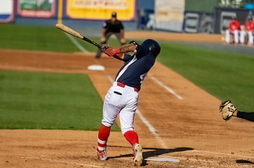 baseball players hitting