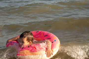 child playing on the beach