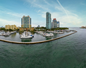 Obraz premium Aerial photo Miami Beach Marina perimeter dock luxury yachts in boat slips
