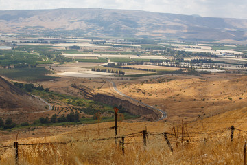 Naklejka premium A sign Danger Mines on Golan Heights, Israel