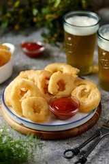 Deep fried onion rings in beer dough. Homemade fast food.