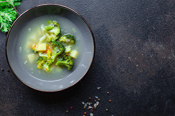 soup broccoli and vegetables first course broth serving portion size natural product vegetarian no meat top view place for text copy space keto or paleo diet