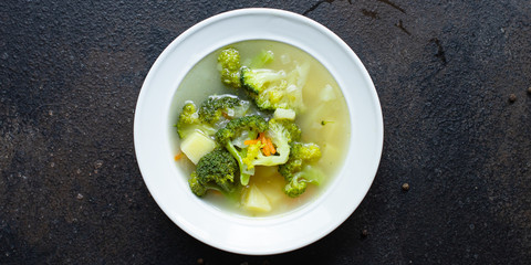 soup broccoli and vegetables first course broth serving portion size natural product vegetarian no meat top view place for text copy space keto or paleo diet