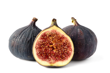 Two ripe figs and a half close-up on a white isolated on white background