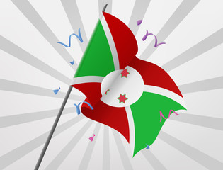 The celebratory flag of Burundi flies at height