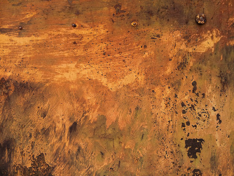 PUERTA DE HIERRO OXIDADA CON COLORES TERROSOS 