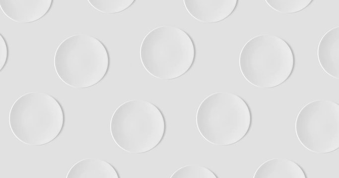 abstract pattern with many white empty plates animated on a gray background, top view, copy space. cakes move in different directions, 4k
